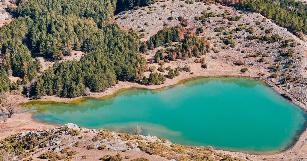 FINAL azure blue lake in the middle of arid land